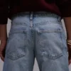 Jeans taille moyenne à jambes larges Topshop