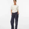 Pantalon coupe classique à taille mi-haute